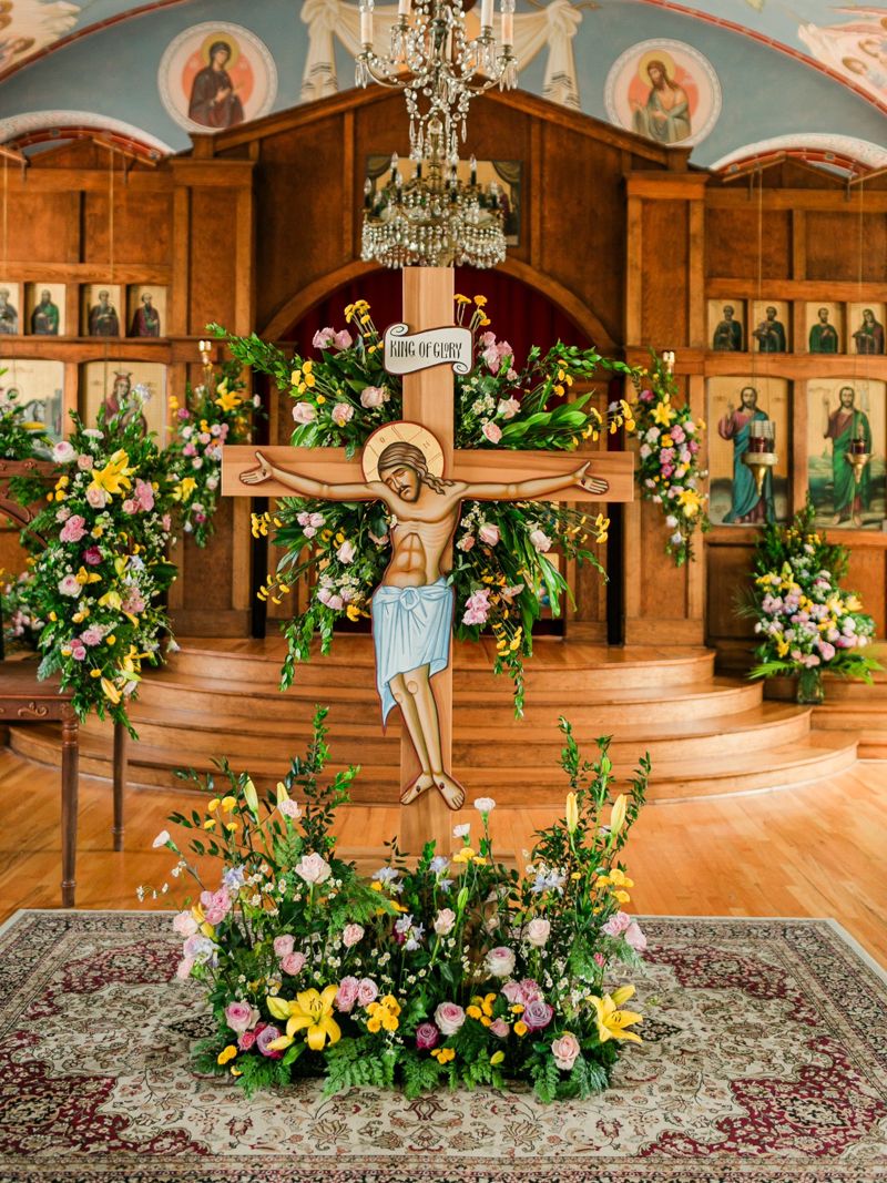 The cross at St. George on Holy Friday, surrounded by flowers