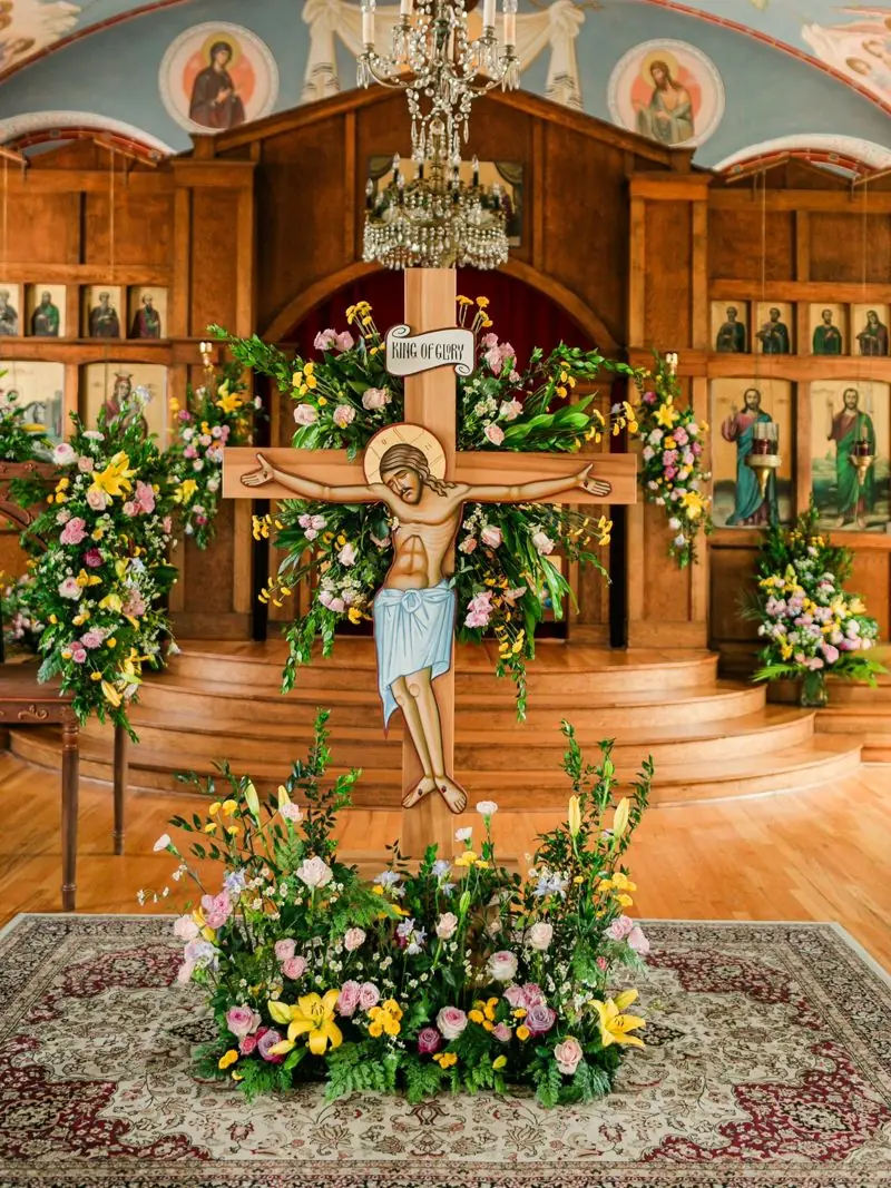 The cross at St. George on Holy Friday, surrounded by flowers